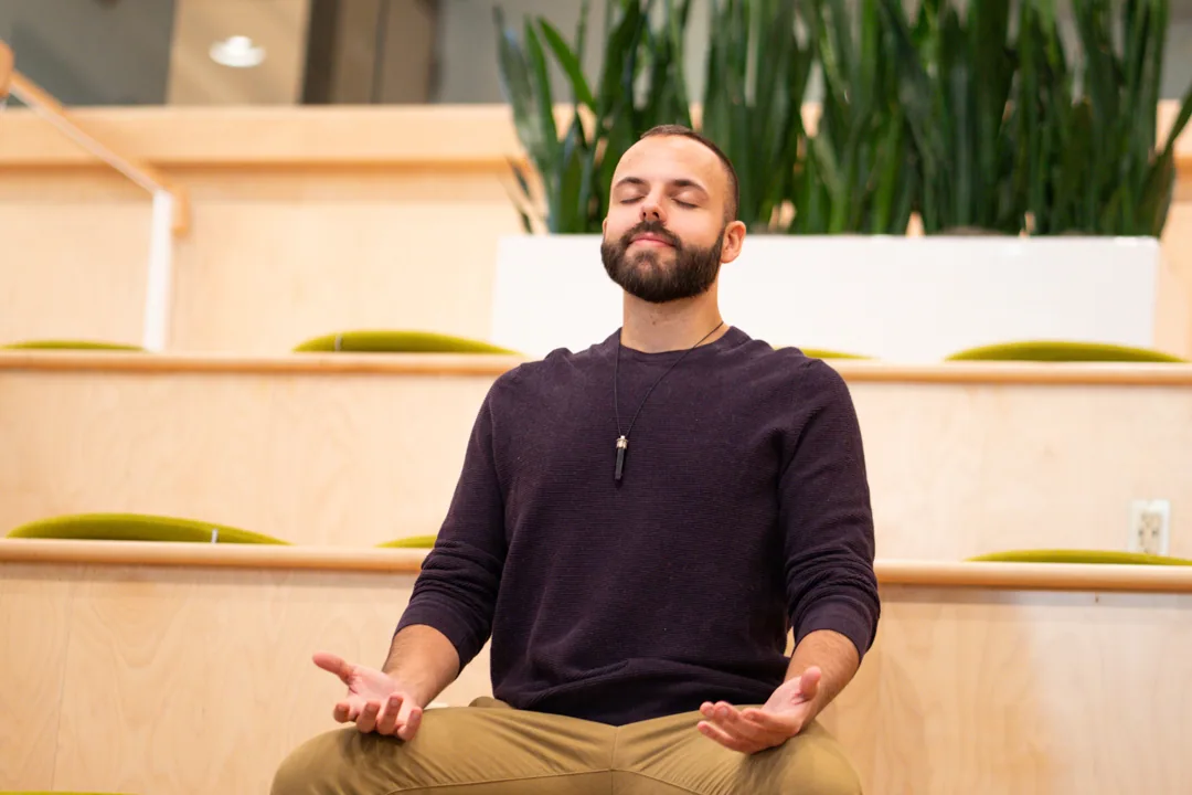 SANTOS seated in meditation